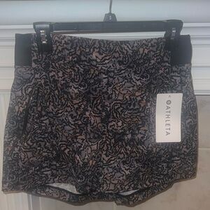 Athleta shorts size 4 with a cozy stretch waist and plenty of pockets.